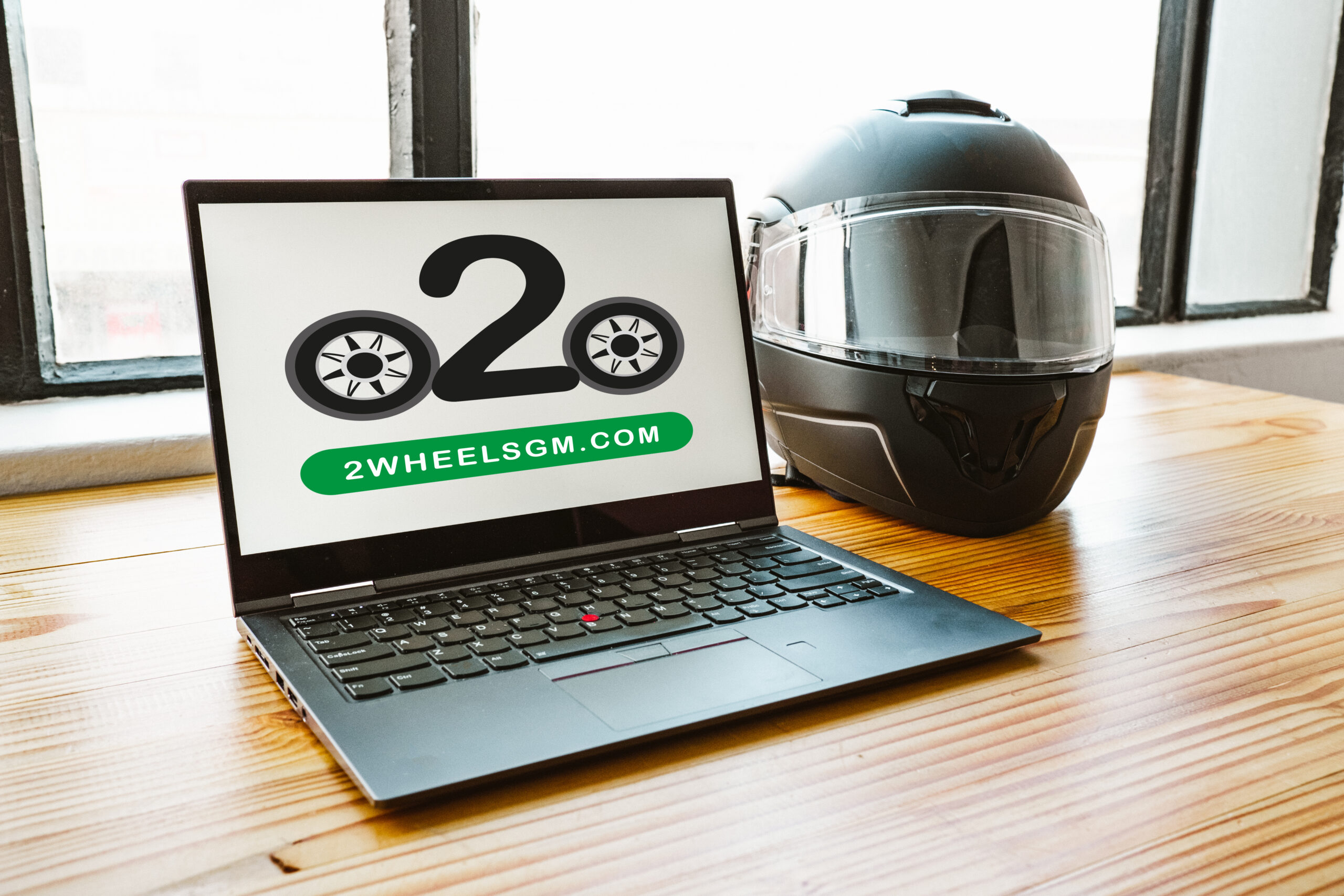 laptop and motorbike helmet